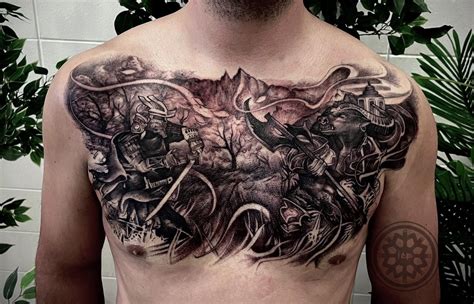 chest cover up tattoo ideas|cool chest tattoos for guys.